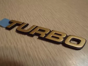 NOS Turbo Emblem 1979 1980 1981 1982 1983 1984 Mercury Capri Ford Mustang 2.3 79 - Foto 1 di 9