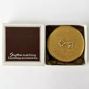 Estuche compacto en polvo de maquillaje Stratton tono dorado 21st Key vintage Inglaterra, en caja - Imagen 1 de 6