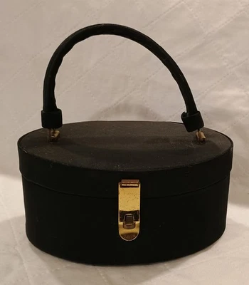 Bolso de mano pastillero ovalado de tela negra dura vintage y espejo con tapa interior Foto 1 de 4
