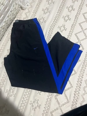 Pantalones deportivos Nike Y2K negros y azules bolsillos cordón para hombre talla grande Foto 1 de 4