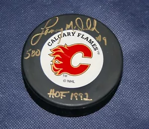 Disco firmato Calgary Flames Lanny McDonald "HOF 1992" - Foto 1 di 3