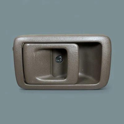 Manija de puerta interior lateral izquierdo Toyota 4Runner 1998-2002 marrón OEM Foto 1 de 4