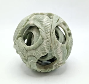 CARVED GREEN SOAPSTONE PUZZLE BALL - CHIPPED. BALL INSIDE BROKEN/PART MISSING - Picture 1 of 10