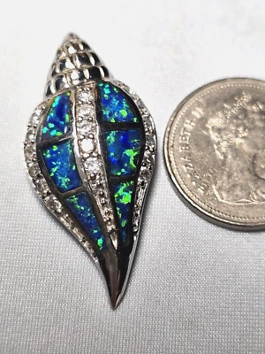 S925 Silver Blue Opal TRITON Conch Shell Pendant 36m Rhodium Coated 6.7 grams CZ - Image 1 of 4