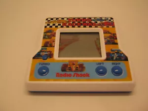 Vintage 1991 Tandy Corp. Radio Shack Turbo Raceway Electronic LCD Handheld Game - Foto 1 di 4