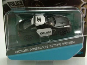 Nissan GT-R R35 2009 Polizia Nero Bianco Modellino 1:64 Maisto - Foto 1 di 2