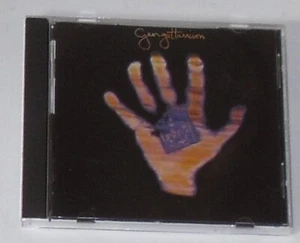 LIKE NEW:GEORGE HARRISON / LIVING IN THE MATERIAL WORLD - CD FREE P&P 1ST ISSUE - Picture 1 of 3