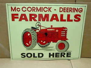 METAL EMBOSSED SIGN McCORMICK DEERING FARMALLS TRACTOR SOLD HERE 10 X 13 - Picture 1 of 4