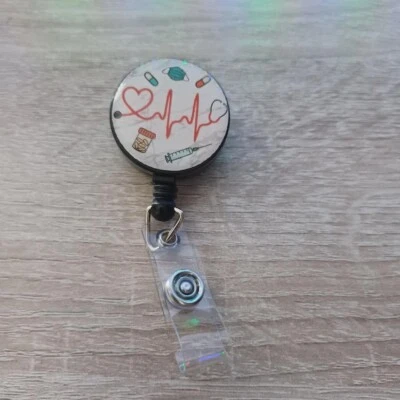 Insignia de identificación médica clip retráctil latido del corazón disparo clip de metal enfermera médico MA PA Foto 1 de 2