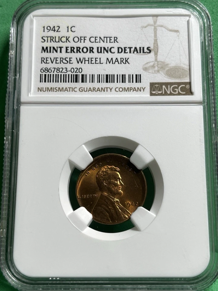 1942 Lincoln 1c STRUCK OFF CENTER MINT ERROR UNC DET. REVERSE WHEEL MARK NGC - Image 1 of 2