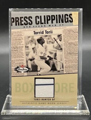TORII HUNTER 2003 FLEER BOX SCORE PRESS CLIPPINGS GAME USED WORN JERSEY Twins - Image 1 of 2