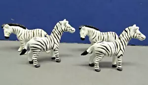 4 ZEBRE: Personaggi giocattolo in plastica che vanno da 2 1/4" a 2 1/2" (#2148) - Foto 1 di 7