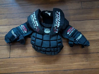 Protector de pecho Tour Retro Light Hockey portero junior pequeño Foto 1 de 3