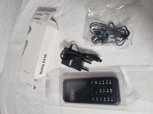 Nokia 5310 + chargeur + casque - Photo 1 sur 3