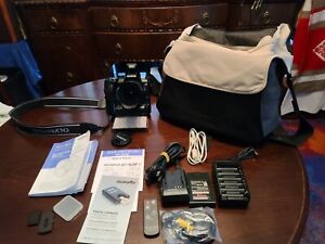 Olympus E-520 Digital Camera with Accessories and Travel Bag