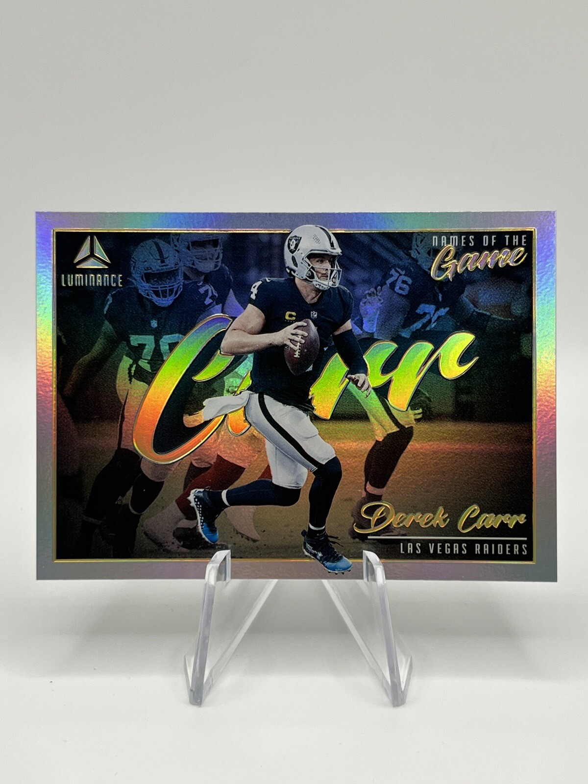 2022 Panini Luminance Derek Carr #NM-DCA Names Of The Game SSP - Raiders
