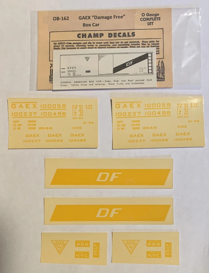 CHAMP O SCALE DECAL-GAEX “DAMAGE FREE” BOX CAR - GREEN w/YELLOW LETT  -  #OB-162 - Image 1 of 1