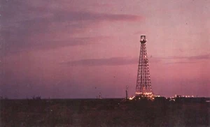 Drilling in Permian Basin of West Texas Lighted Oil Derrick Odessa 1966 Postcard - Picture 1 of 2