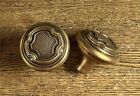 Pair Antique Fancy Wrought Brass Raised Emblem Doorknobs, c1900