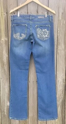 Pantalones de mezclilla Wrangler Rock 47 para mujer talla 29x 34 azul corte boot tiro ultra bajo Foto 1 de 4