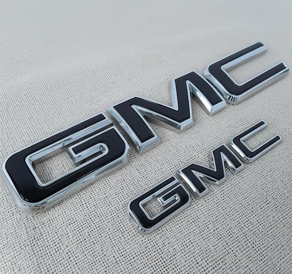2021-2024 GMC Yukon Yukon XL GM Front & Rear Chrome Black Emblem Kit 84729912 - Image 1 of 3