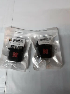 University of Nebraska Lincoln Black Apple Air Pod Case Lot of 2 - Image 1 of 2