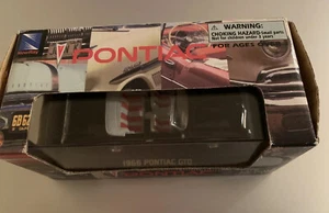 Die-cast 1966 Pontiac GTO 1:43 - Picture 1 of 7