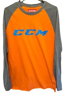 Camiseta de hockey manga larga CCM. Naranja con mangas grises. Talla grande. Usado en excelente estado - Imagen 1 de 5