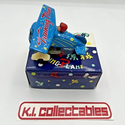 Avión de entrenamiento vintage litográfico verde cuerda MS01 + caja funciona Foto 1 de 4