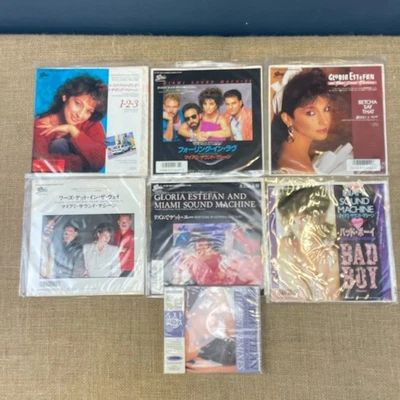 7 X GLORIA ESTEFAN & MIAMI SOUND MACHINE SINGLES 7" VINYLS CD -JAPANESE EDITIONS - Image 1 of 4