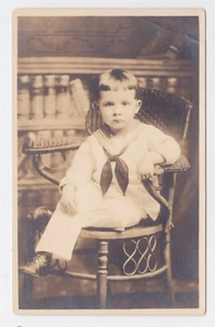 RPPC OF SMALL BOY IN SAILOR OUTFIT SITTING ON CHAIR 1921 DATE - Picture 1 of 2