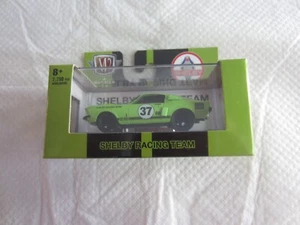2021 M2 Machines Ground Pounders: Verde 1967 Shelby G.T. 500 nuove con scatola - Foto 1 di 3