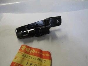 NOS Suzuki OEM Black Front RH Footrest 1984 & 1987 RM125 RM250 43551-14600 - Picture 1 of 2