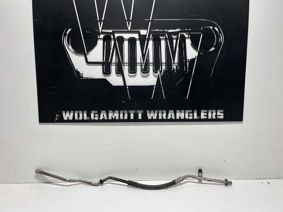 4.0 TJ OEM A/C Line Evaporator to Condenser Hose 97-98 Jeep Wrangler CC 31 - Image 1 of 4