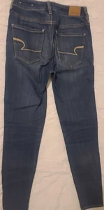 AMERICAN EAGLE OUTFITTERS SUPER HI-RISE MEDIUM WASH JEGGING JEANS Size 0 SHORT - Picture 1 of 7