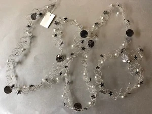 Ghirlanda argento lamellare filo stella decorazione tavolo 230 cm - Foto 1 di 3