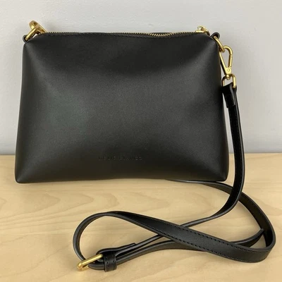 Bolso Bandolera Melie Bianco Para Mujer Negro Cuero Vegano Acentos Dorados - Imagen 1 de 4