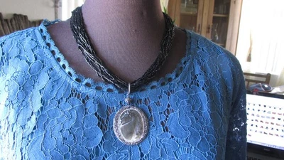 hand carved mother of pearl  Marcasite horse  pendant with black beads necklace  - Image 1 of 4