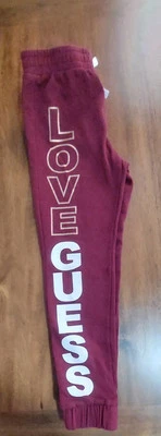 Pantalones deportivos beige con pierna decorativa Guess para niñas grandes talla 7-8 Foto 1 de 4