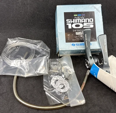 Juego de palancas de cambio tubo descendente Shimano 105 SL-1051 SIS 7 velocidades NUEVO EN CAJA Foto 1 de 4