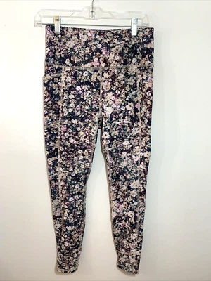 Leggings Reebok tamanho M creme roxo floral bolsos puxar cintura larga - Imagem 1 de 4