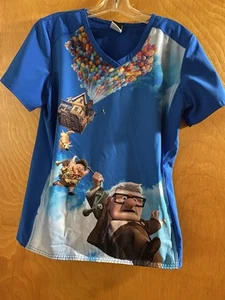 DISNEY PIXAR SMOCK TOP MEDICAL DENTAL VETERINARY WOMENS SIZE SMALL SCRUBS TOP - Bild 1 von 3