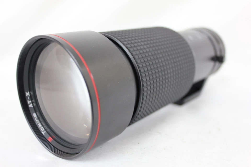 Garantía de devolución Tokina AT X SD 100 300mm F4 con montaje de trípode para montaje Canon FD Foto 1 de 4