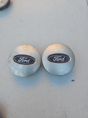 TAPA CENTRAL DE RUEDA FORD EXPLORER EDGE FLEX TAURUS OEM PLATEADA ARNJA2006-2015 Foto 1 de 2