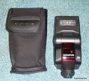 Flash attacco scarpa Olympus FL 36R con custodia originale modello FL-36R - SPEDIZIONE VELOCE! - Foto 1 di 3