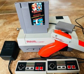 NES-001 Console With 2 Controllers, 1 Game, Zapper, Power Supply, and RF Switch
