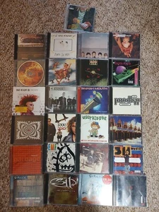Lot 25 CDs 311 Devo Garbage Stir Prodigy INXS Dolls - Picture 1 of 4