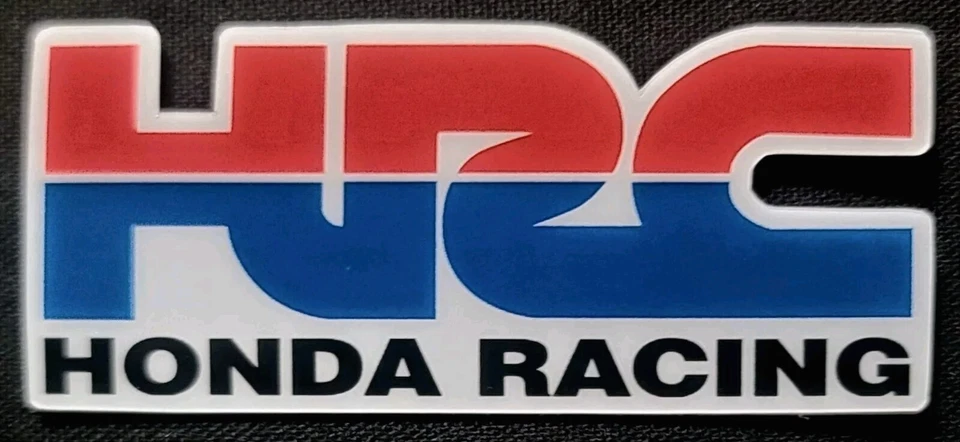 PEGATINA HONDA RACING "HRC" 3 X 1 3/8" BRILLANTE GRUESA IMPERMEABLE EXTERIOR  Foto 1 de 1