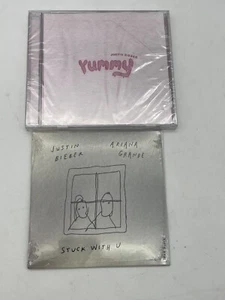 Justin Bieber, Ariana Grande – Stuck With U & Yummy (Singles) - Picture 1 of 9