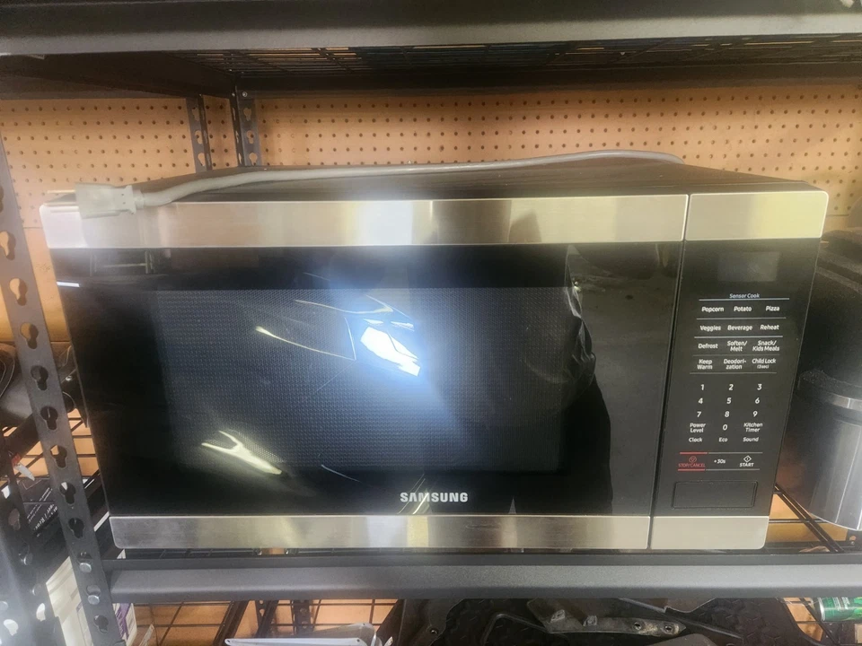 1,9 cu. Microondas de encimera de pies con sensor de cocción en acero inoxidable Foto 1 de 3